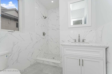 Welcome to this brand-new construction 7-over-7 two-family home - photo 39