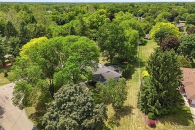Welcome home to this stunning Bloomfield Hills ranch, where - photo 40
