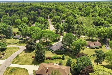 Welcome home to this stunning Bloomfield Hills ranch, where - photo 44