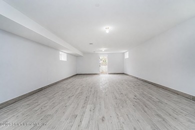 Welcome to this brand-new construction 7-over-7 two-family home - photo 19