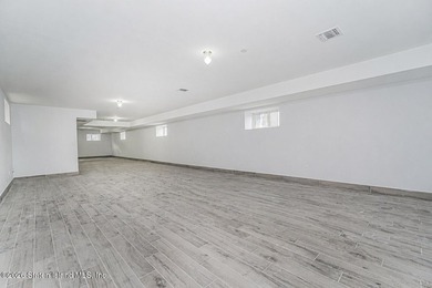 Welcome to this brand-new construction 7-over-7 two-family home - photo 20