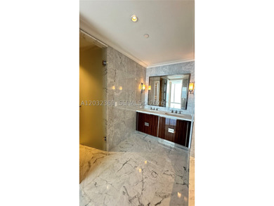 Welcome to the epitome of luxury living at the Ritz-Carlton - photo 21