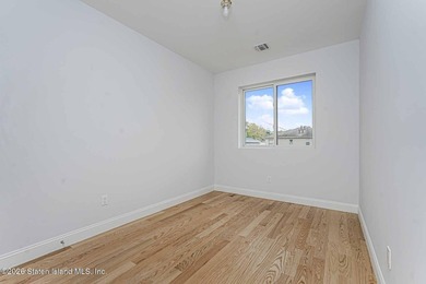 Welcome to this brand-new construction 7-over-7 two-family home - photo 34