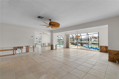 WATERFRONT HOME W/NEW ROOF ON OVERSIZED TIP LOT & EXTREMELY - photo 3
