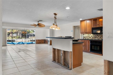 WATERFRONT HOME W/NEW ROOF ON OVERSIZED TIP LOT & EXTREMELY - photo 7