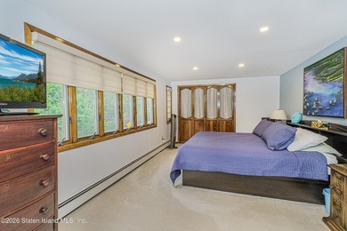 Welcome to 180 Kissel Ave, a beautifully expanded 3-bedroom cape - photo 16