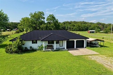 Recently updated 3-bedroom, 2-bath home situated on 5 beautiful - photo 1