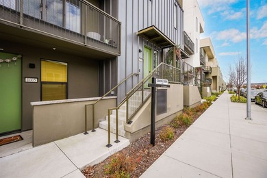 Built in 2021, this sophisticated townhouse-style condominium - photo 3