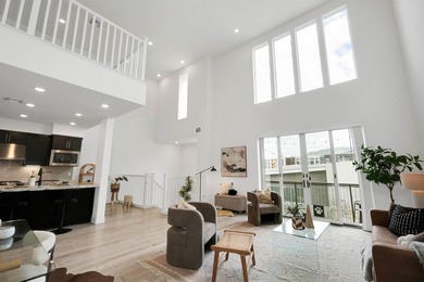 Built in 2021, this sophisticated townhouse-style condominium - photo 6