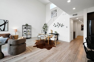 Built in 2021, this sophisticated townhouse-style condominium - photo 9