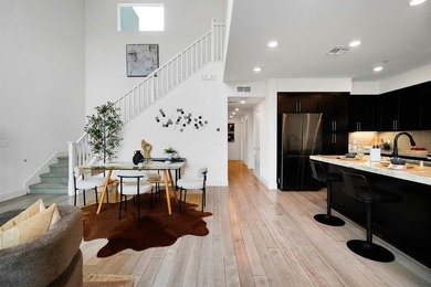 Built in 2021, this sophisticated townhouse-style condominium - photo 10