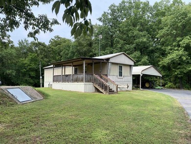Lake Ouachita Home Active Under Contract in Mount Ida Arkansas