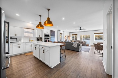 Welcome to this beautiful 4-bedroom, 3.5-bath lake home in the - photo 4