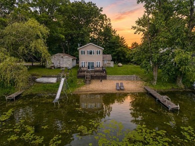 Escape to the peaceful shores of Brown Lake with this charming - photo 1