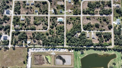 This vacant lot is located in the established Peace River Shores - photo 4