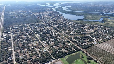 This vacant lot is located in the established Peace River Shores - photo 5
