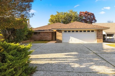 Fabulous light-filled 3-bedroom, 2-bath home tucked away on a