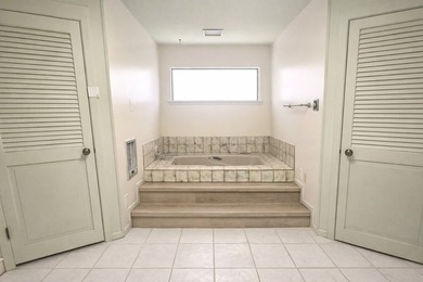 Fabulous light-filled 3-bedroom, 2-bath home tucked away on a