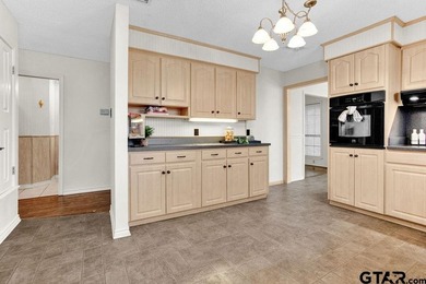 This comfortable home is nestled back in the pine trees on a - photo 12