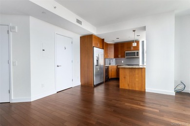 Welcome to Unit 9C at The Aston, a bright and modern high-floor - photo 2