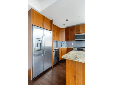 Welcome to Unit 9C at The Aston, a bright and modern high-floor - photo 9