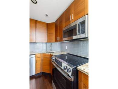 Welcome to Unit 9C at The Aston, a bright and modern high-floor - photo 10
