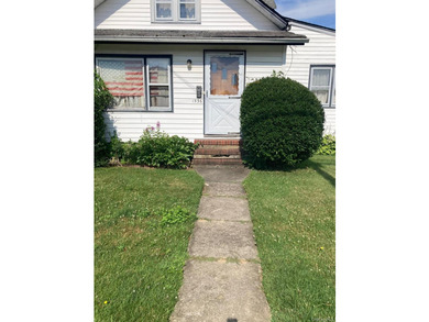 4 Bedroom Bungalow Located Mid-Block On A 75X125 Lot Features - photo 1