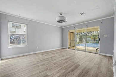 REO. Spacious 4-bedroom, 2-bath home with a screened inground - photo 28