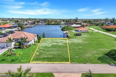 Gulf access, southern exposure, and wide canal views make this - photo 1