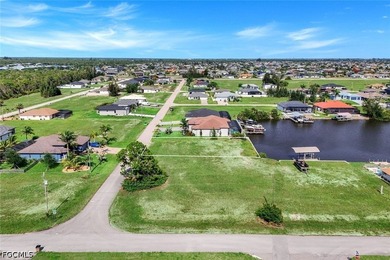Gulf access, southern exposure, and wide canal views make this - photo 2