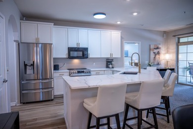 Experience resort-style living in this beautifully remodeled and - photo 3