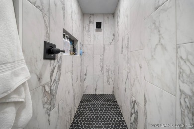 Welcome to this Gorgeously updated Lakefront Condo! This unit