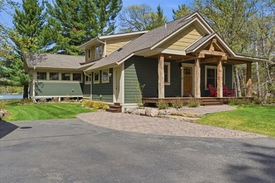 Nestled on the shores of Lake Ossawinnamakee, this stunning - photo 1