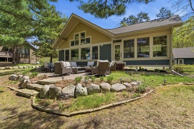 Nestled on the shores of Lake Ossawinnamakee, this stunning - photo 2