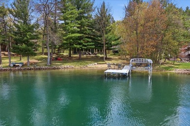 Nestled on the shores of Lake Ossawinnamakee, this stunning - photo 3