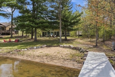 Nestled on the shores of Lake Ossawinnamakee, this stunning - photo 6