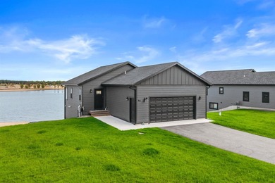 Enjoy turnkey living at Sand Point Lake with this newly built - photo 1