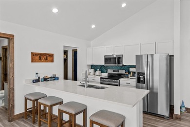 Enjoy turnkey living at Sand Point Lake with this newly built - photo 3