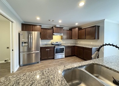 Discover this inviting, low-maintenance brick home in Hamilton - photo 7