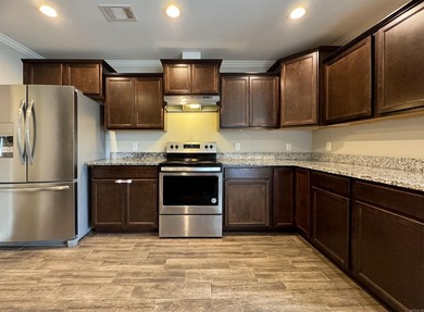 Discover this inviting, low-maintenance brick home in Hamilton - photo 8