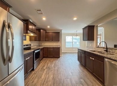 Discover this inviting, low-maintenance brick home in Hamilton - photo 10