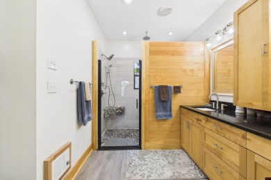 Escape to this 3BR/2BA country retreat on 12.9 acres m/l in