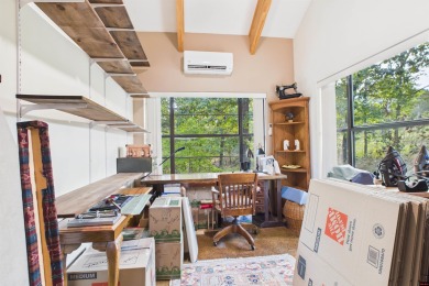 Escape to this 3BR/2BA country retreat on 12.9 acres m/l in