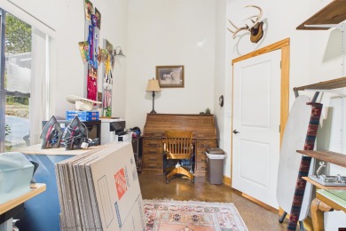 Escape to this 3BR/2BA country retreat on 12.9 acres m/l in