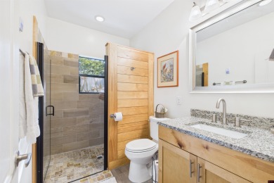 Escape to this 3BR/2BA country retreat on 12.9 acres m/l in