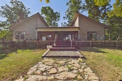 Escape to this 3BR/2BA country retreat on 12.9 acres m/l in