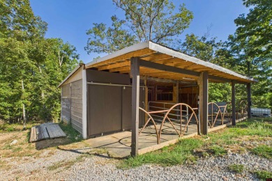 Escape to this 3BR/2BA country retreat on 12.9 acres m/l in