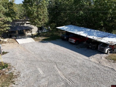 Escape to this 3BR/2BA country retreat on 12.9 acres m/l in