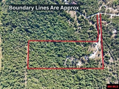 Escape to this 3BR/2BA country retreat on 12.9 acres m/l in