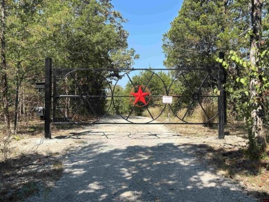 Escape to this 3BR/2BA country retreat on 12.9 acres m/l in